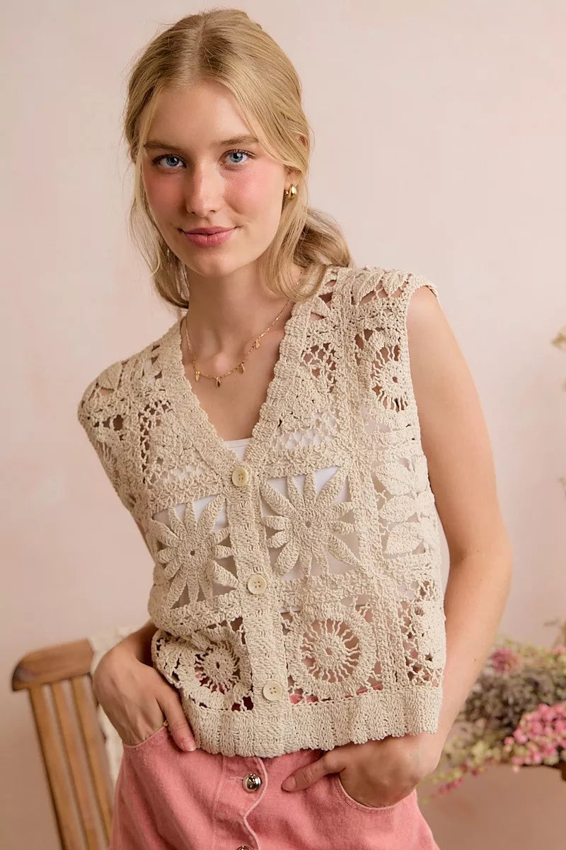 Natural crochet sleeveless vest top with V-neck, button front, and floral square pattern