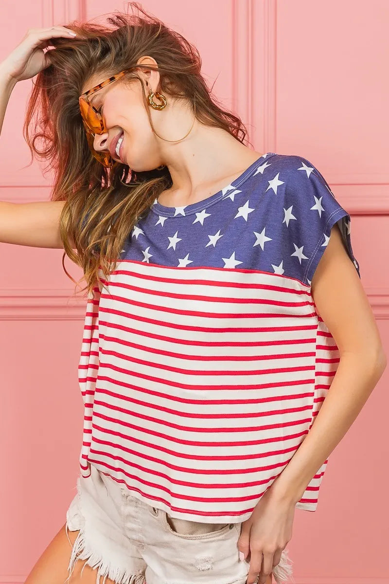 Navy star print and red-and-white striped short-sleeve top with curved neckline