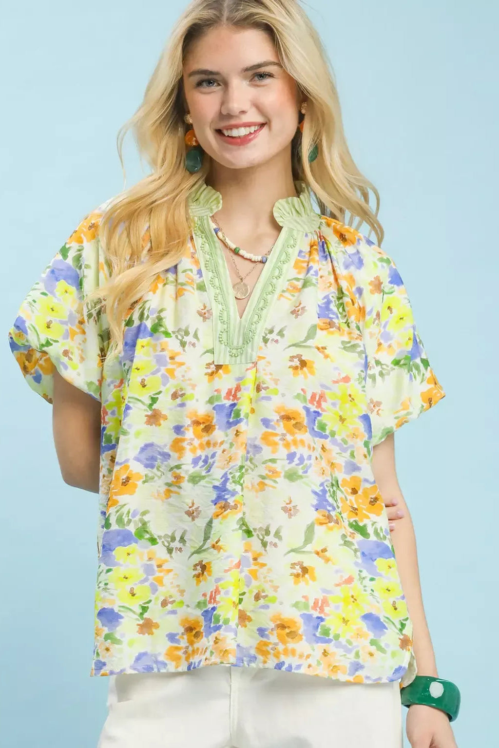 Green watercolor floral blouse with keyhole V-neck and short puff sleeves