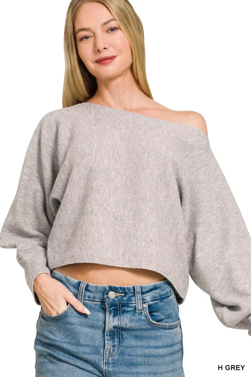 Grey boat-neck knit sweater with off-shoulder drape and balloon sleeves