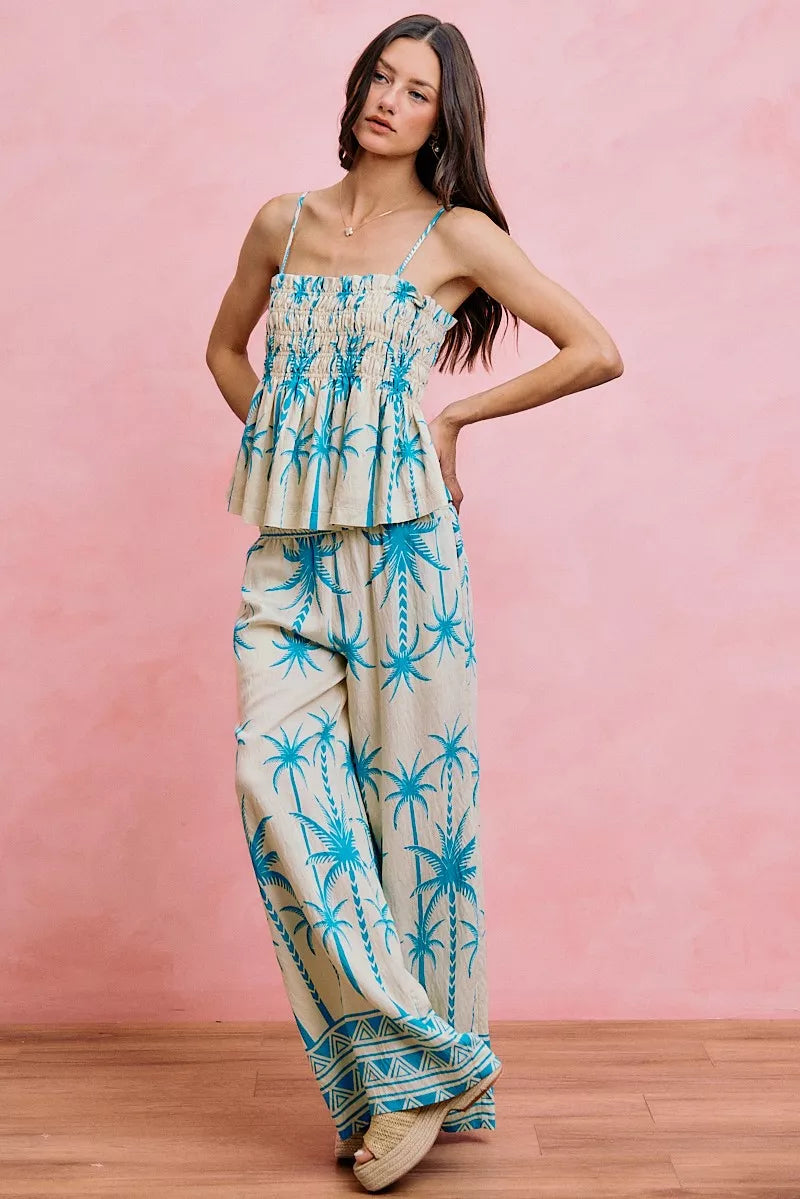 Blue palm tree adjustable cami top with smocked bodice and flared ruffle tiers