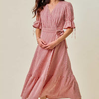 Red and white striped wrap midi dress with V-neck and tiered layered skirt