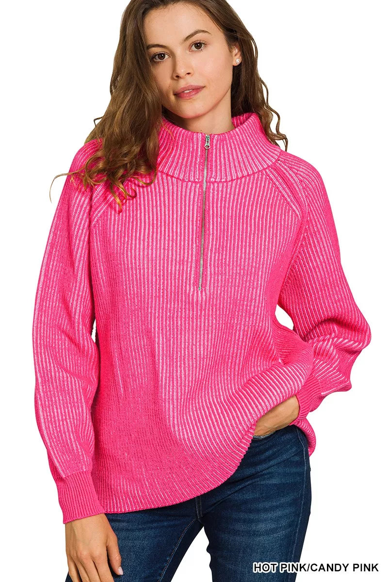 Hot pink ribbed half-zip sweater with tall collar, long sleeves, side view
