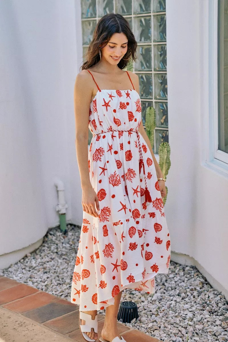 Red-and-white shell print tiered midi cami dress with belt, tiered hem, lined, spaghetti straps