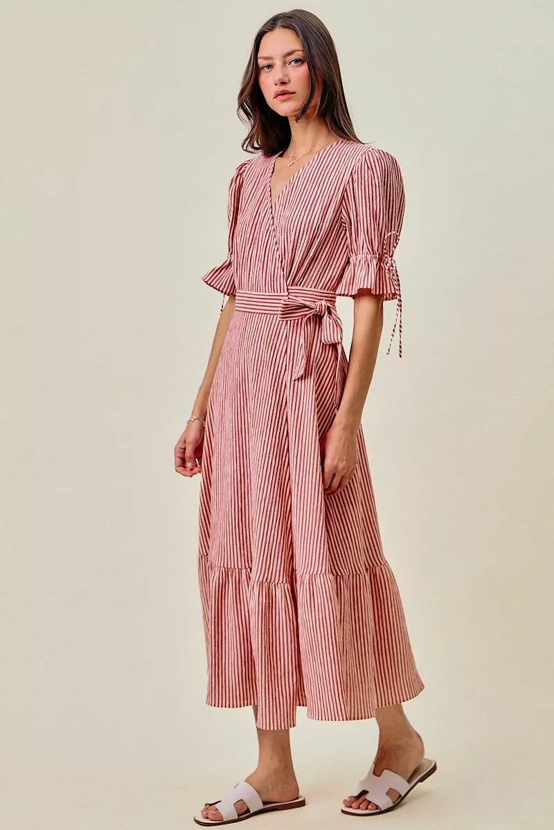 Red striped wrap midi dress with V-neck, puff sleeves, and tiered skirt
