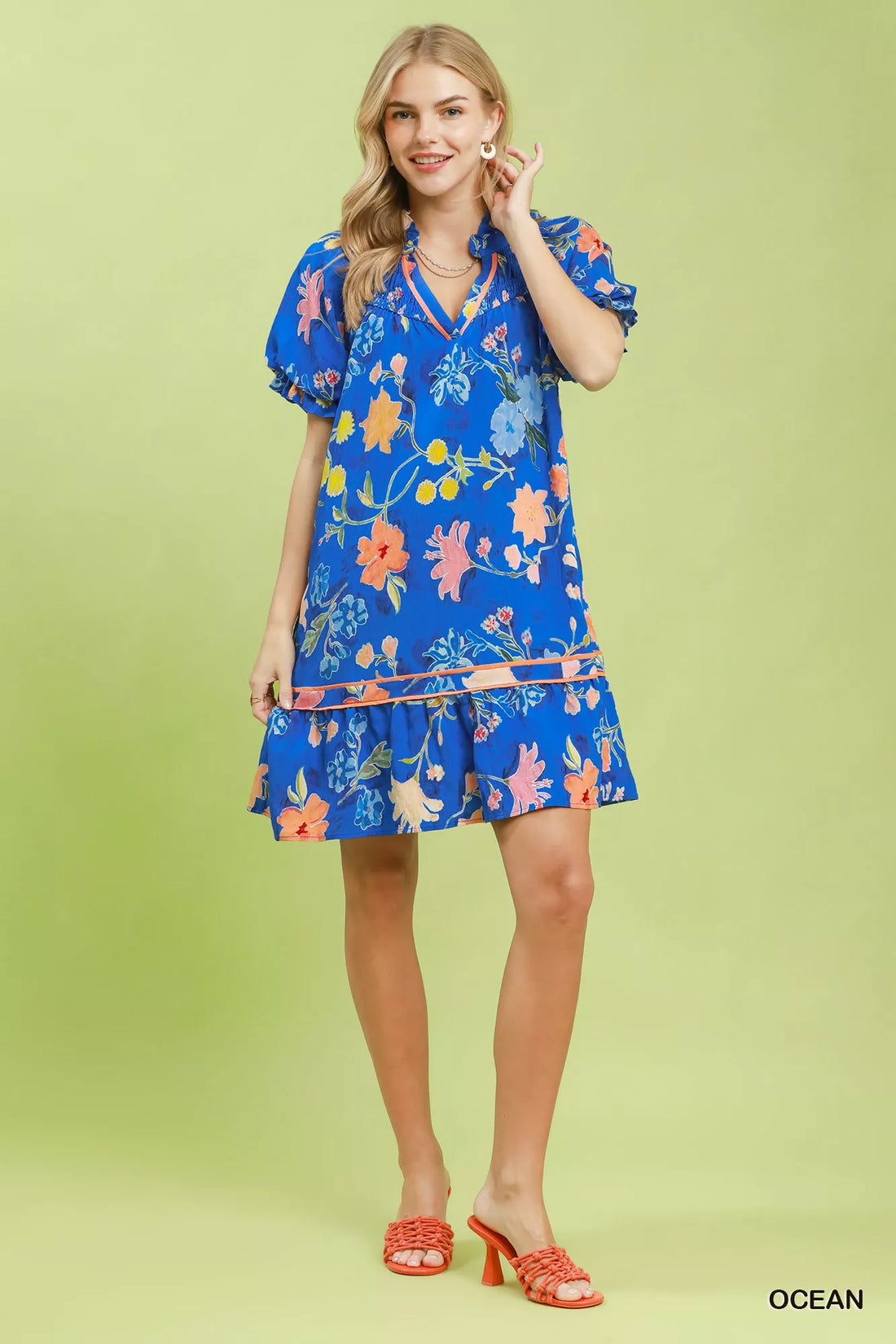 Blue floral mini dress with V-neck, ruffle tiers, and puff sleeves