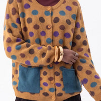 Plus-size mustard polka-dot button cardigan with two blue front patch pockets, long sleeves