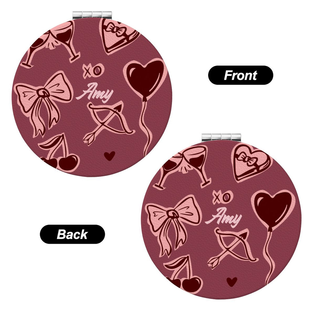 Round compact mirror with pink designs on a white background