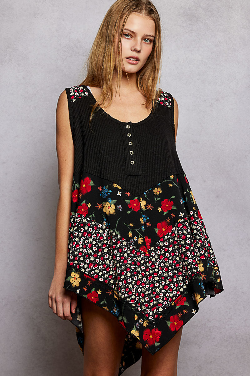 Black ribbed tank top with floral woven patch, button front, uneven hem