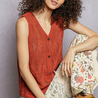 Rust orange knit sleeveless V-neck sweater vest with central button front