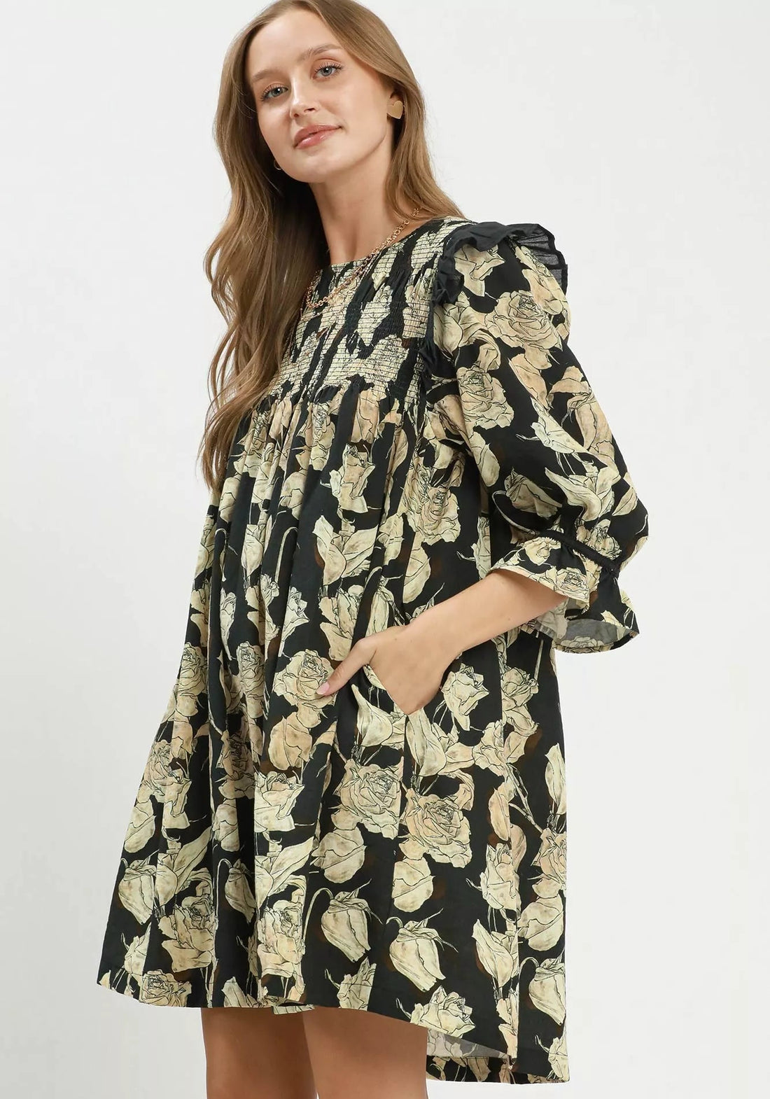 Black floral smocked ruffle dress with three-quarter puff sleeves