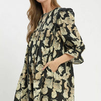 Black floral smocked ruffle dress with three-quarter puff sleeves