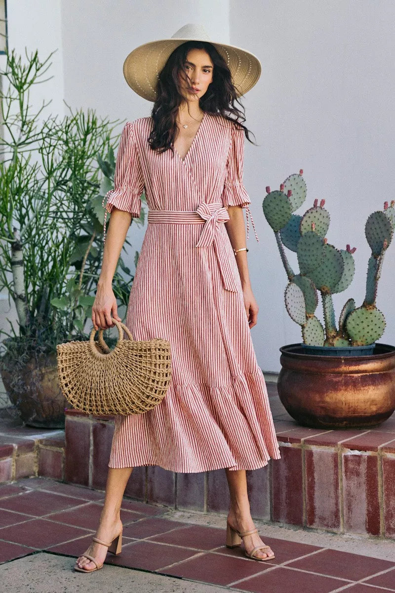 Red and white striped wrap midi dress with belted waist and ruffled tiered skirt