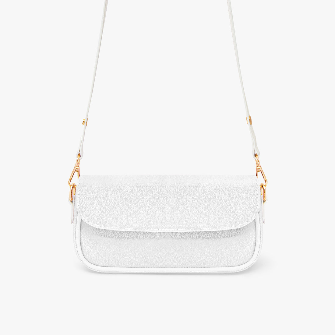 White mini shoulder bag with textured flap and thin gold chain shoulder strap.