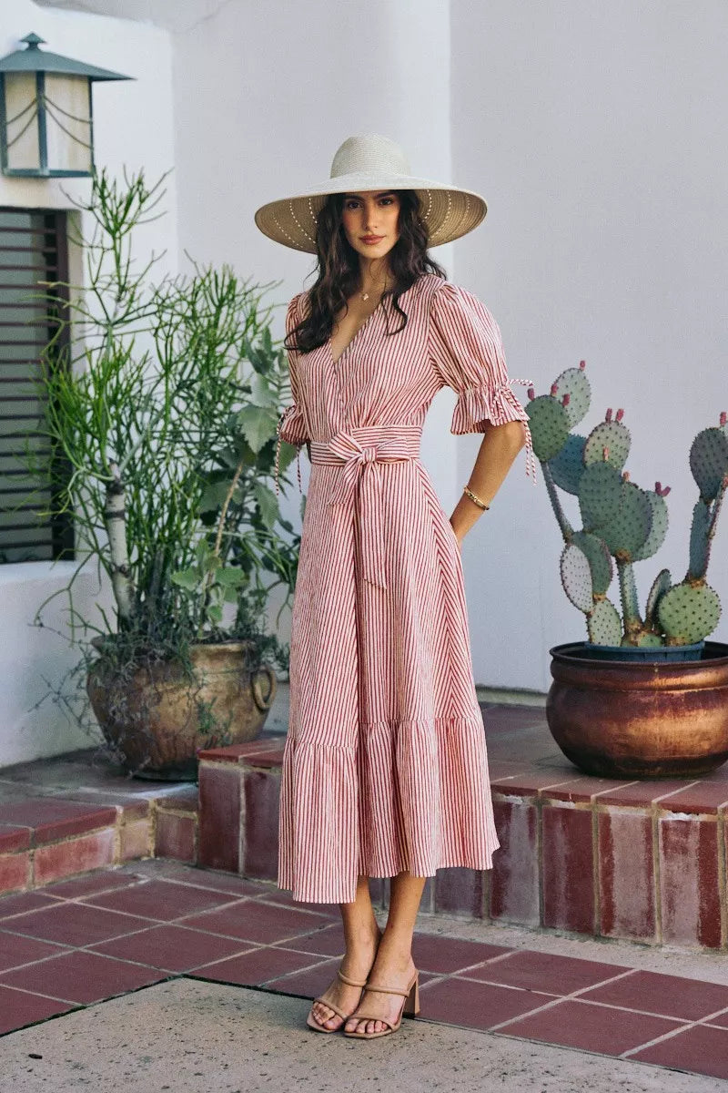 Red-and-white striped wrap midi dress with V-neck, tied waist belt, short puff sleeves