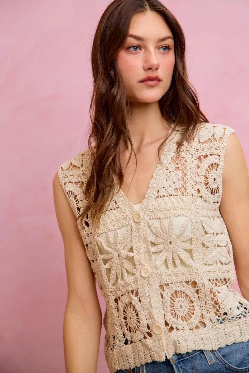 Natural crochet sleeveless vest top with V-neck and detailed circular floral motifs