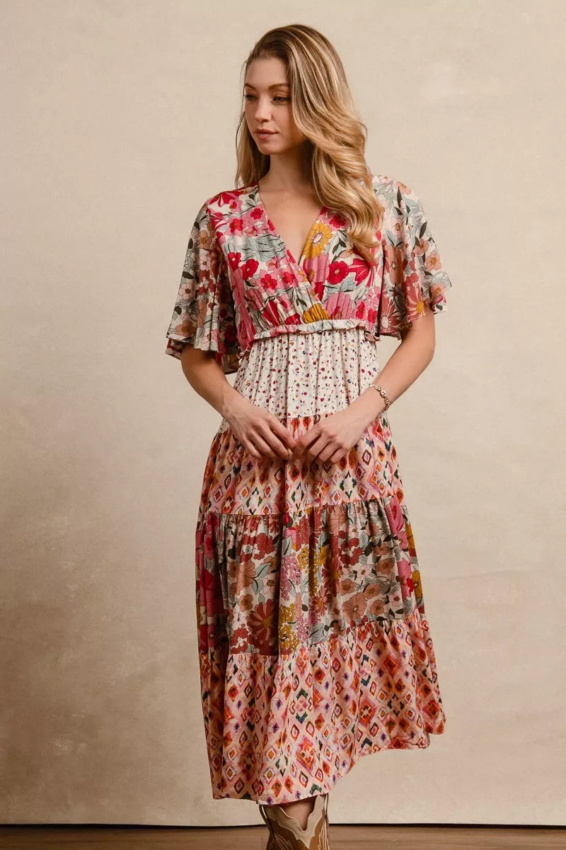 Floral print tiered midi dress with V-neck and ruffled bodice, gathered waist