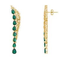 Gold-tone drop earrings with emerald green oval gemstones and hinged back