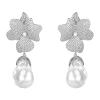 Silver flower drop earrings with textured petals and white pearl dangle