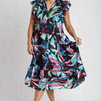Plus size midi dress with ruffled sleeves, tiered midi skirt, multicolor leaf print.