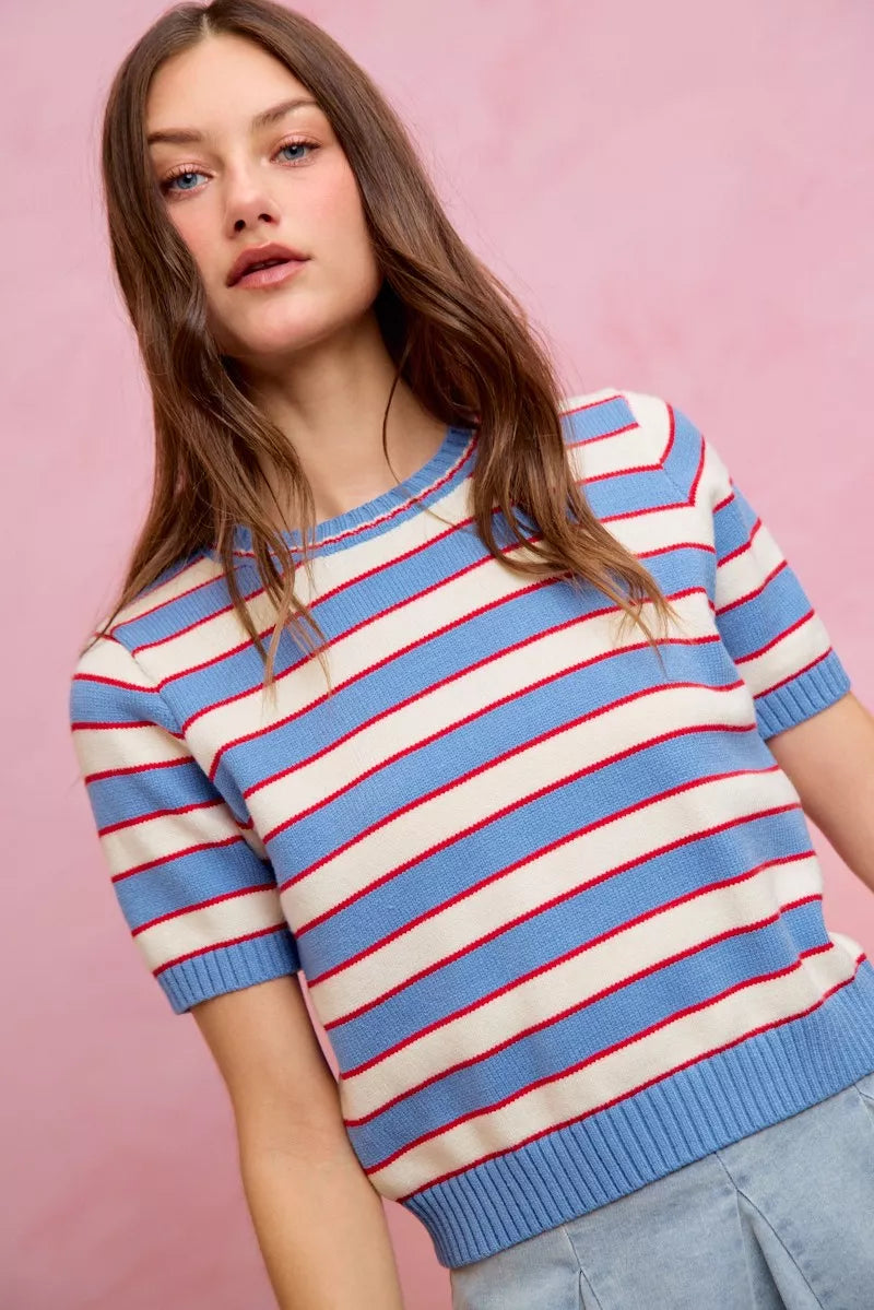Short-sleeve striped knit sweater top with crew neck; blue hem and cuffs, red and white lines