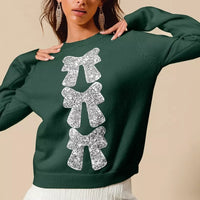 Hunter-green Christmas sweater with vertical silver sequin bow ribbon embellishment