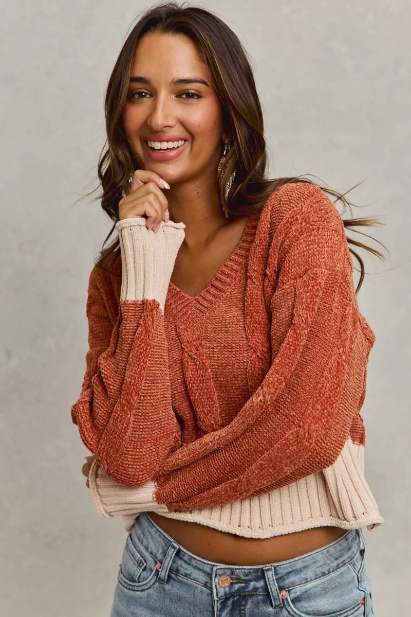 Rust chenille V-neck cropped sweater with cream contrast hem and cuffs