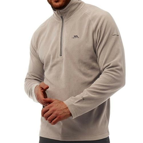Man wearing a light gray microfleece quarter-zip top