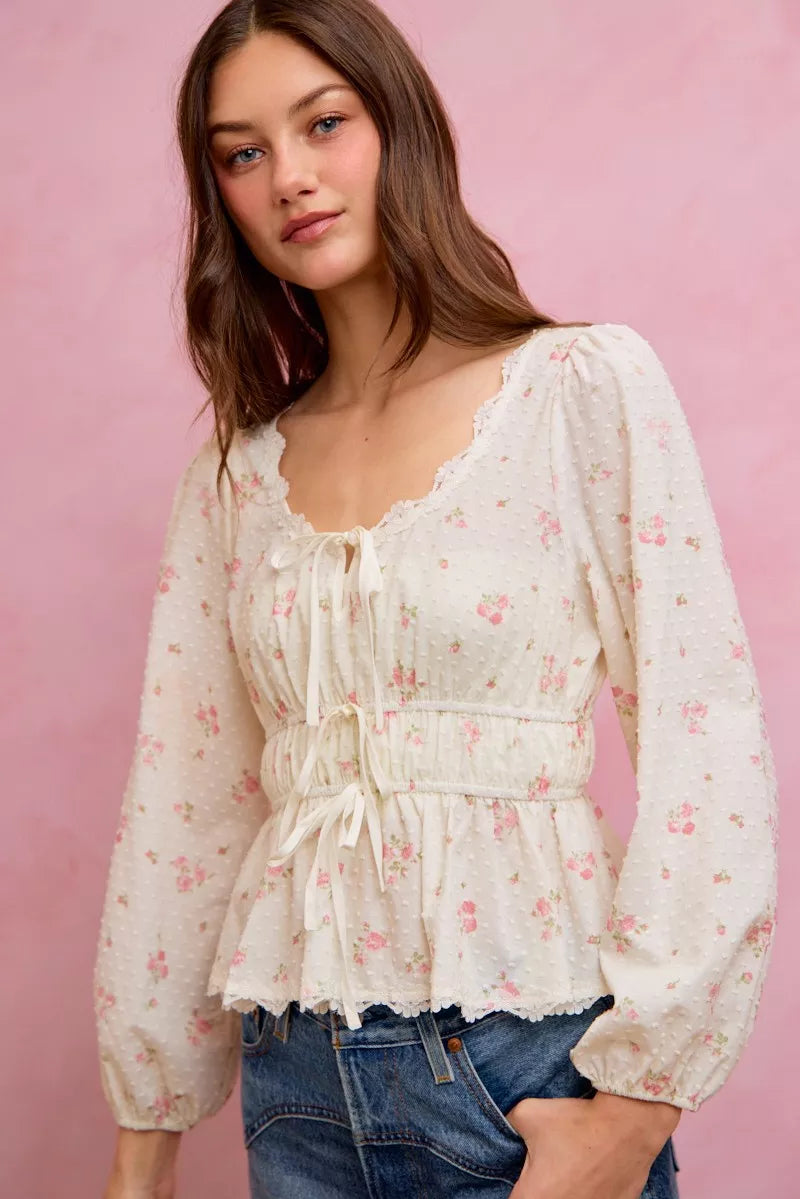 White floral clip-dot lace-trim ruched blouse with long puff sleeves and peplum silhouette
