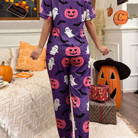 Purple Halloween pajama set with button-front short-sleeve top and long pants, ghost and pumpkin print