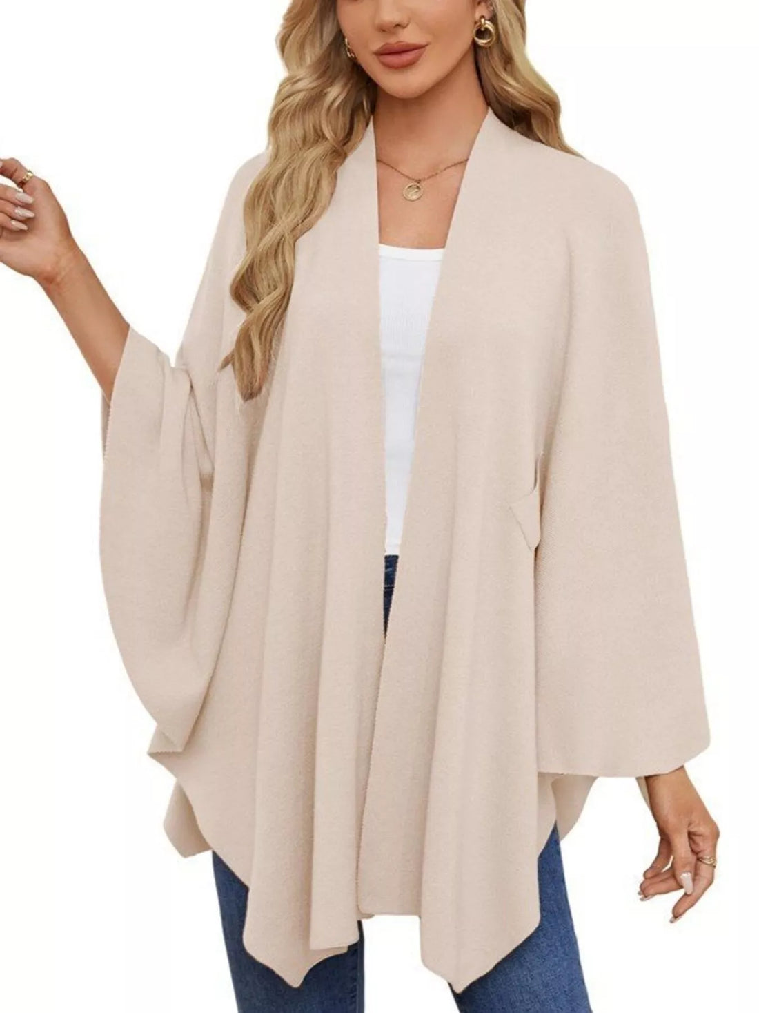 Ivory shawl cape with open front drape and loose sleeves, tied at the waist