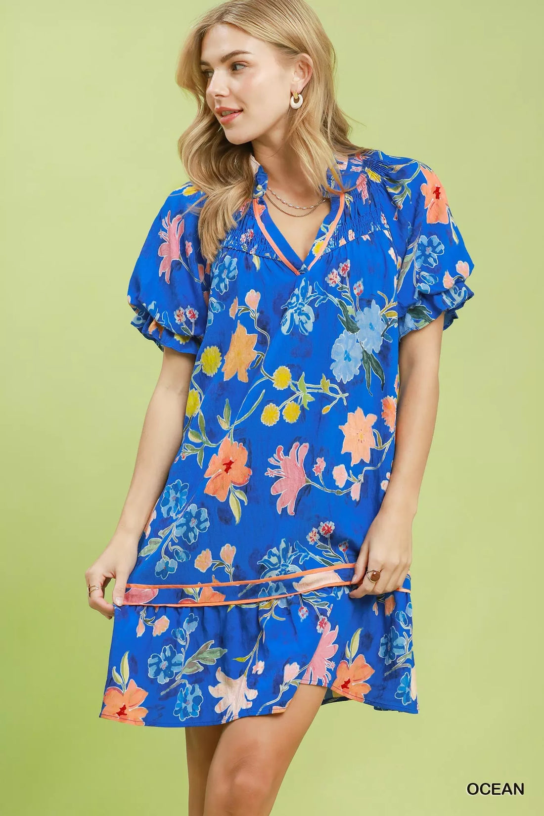 Blue floral mini dress with V-neck and tiered ruffle hem