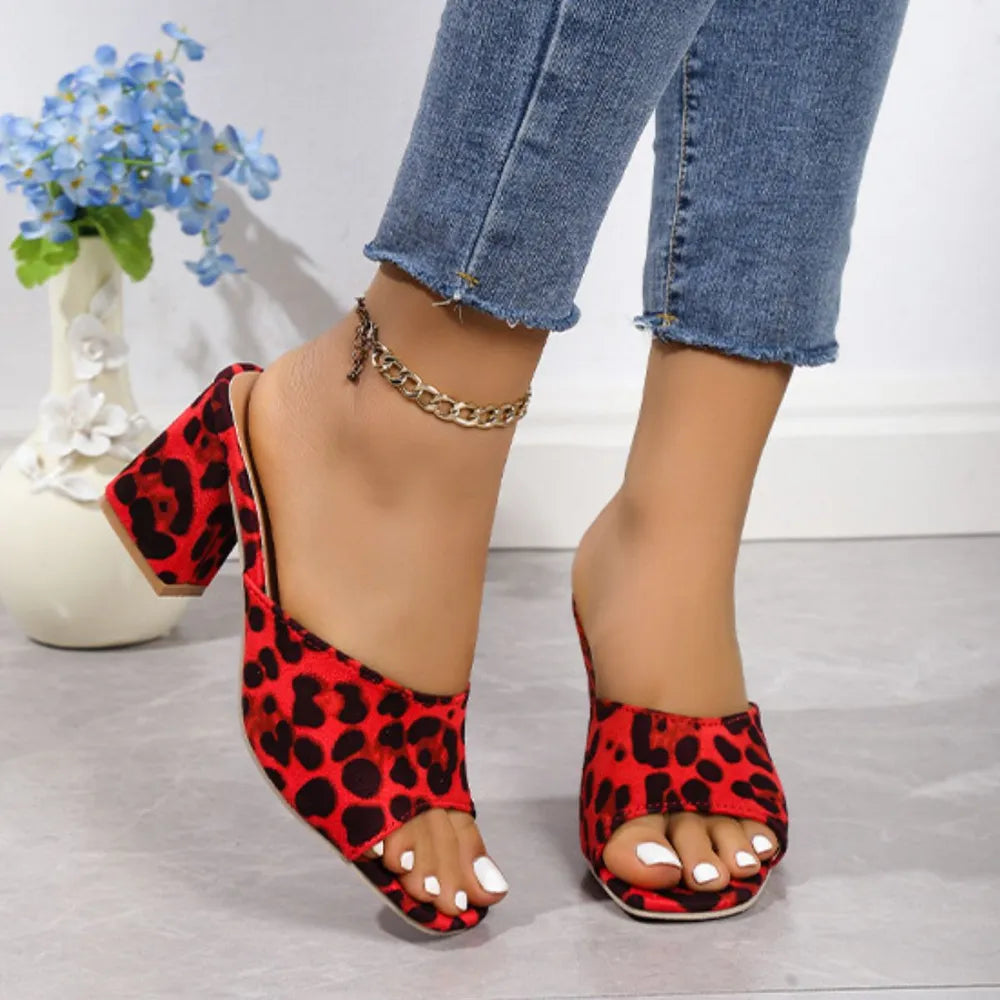 Red leopard print suede sandals with chunky block heel, open toe, ankle chain