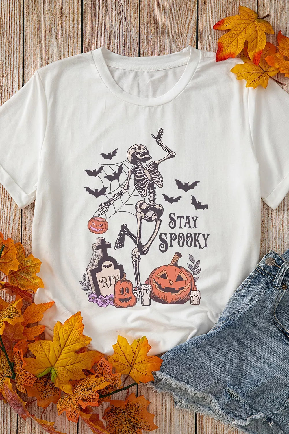 White Halloween graphic T-shirt with skeleton, jack-o&