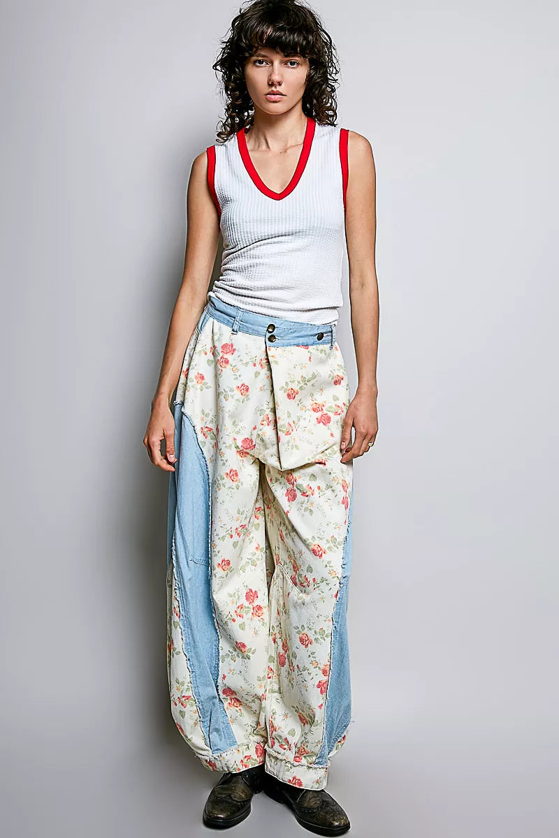 Off-white ribbed V-neck sleeveless tank with red contrast trim