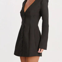 Black blazer dress with deep V-neck, long sleeves, and button front