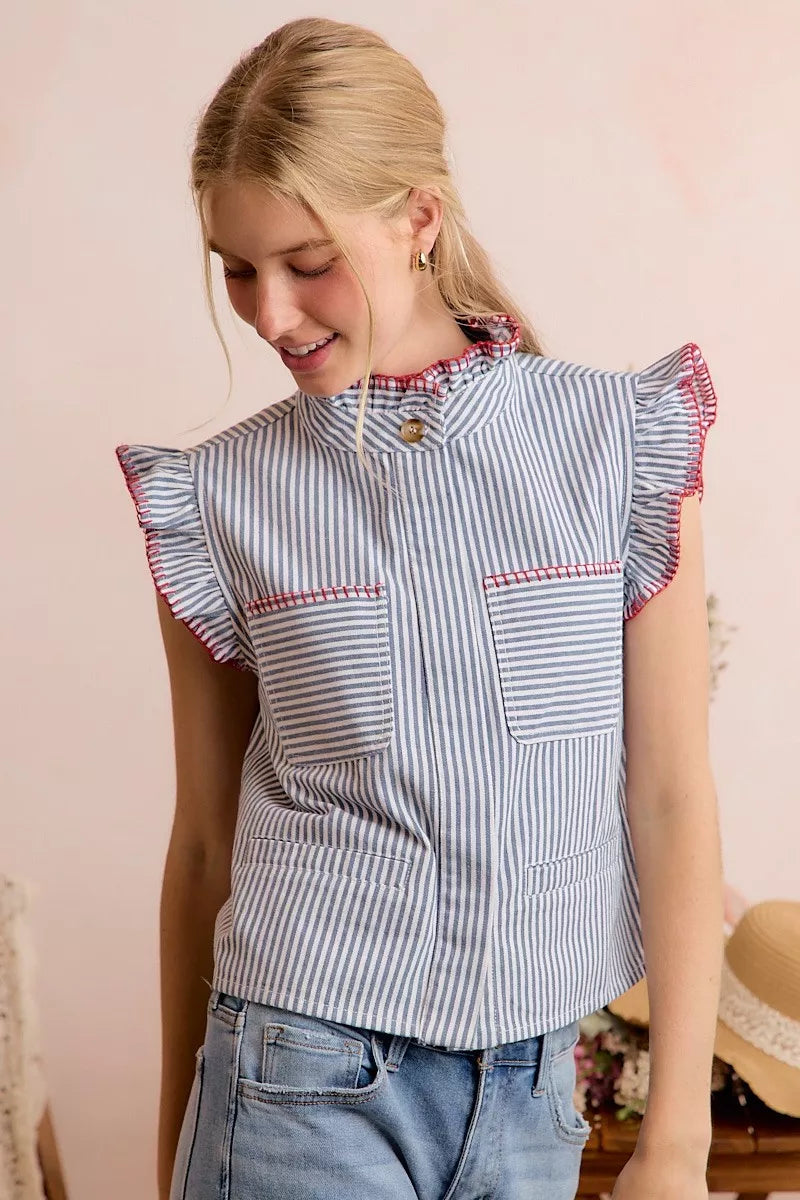 Blue and white striped sleeveless vest top with ruffled shoulders and high neck