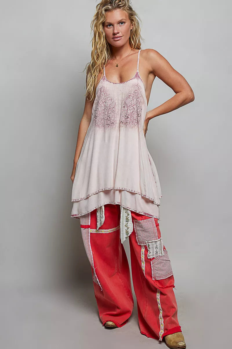 Sleeveless cotton mini dress with rose-pink embroidery and scalloped border at hem