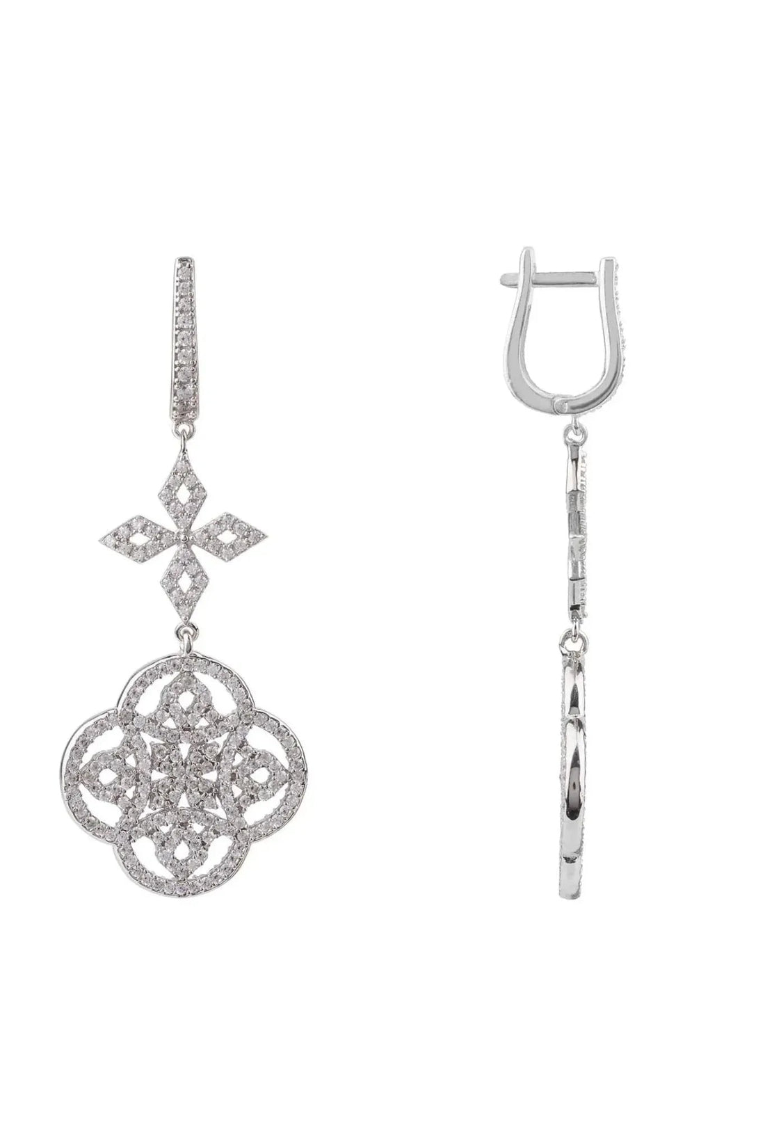 Silver drop earrings featuring cross-shaped charm and clover medallion detail