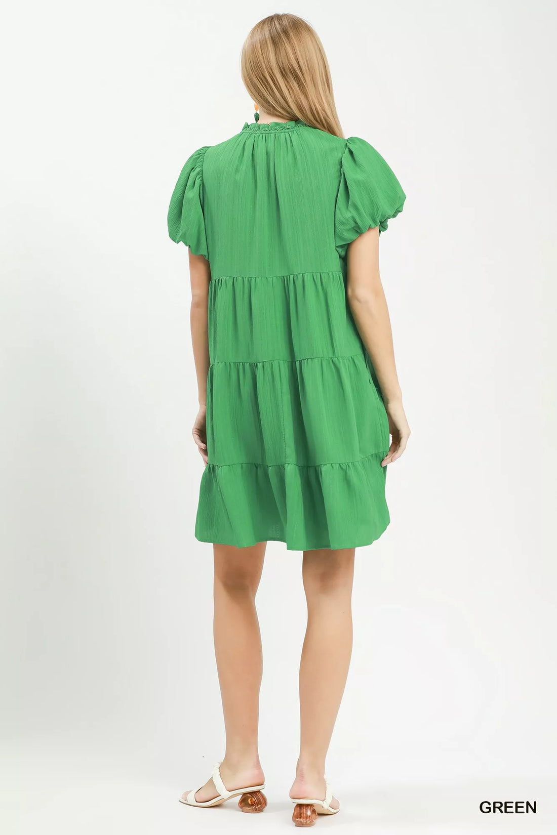 Green tiered babydoll dress, back view with puff sleeves
