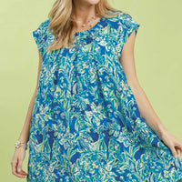 Blue tropical floral flutter sleeve swing dress with scoop neckline