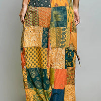 Patchwork wide-leg printed pants with elastic waistband and side drawstring ties