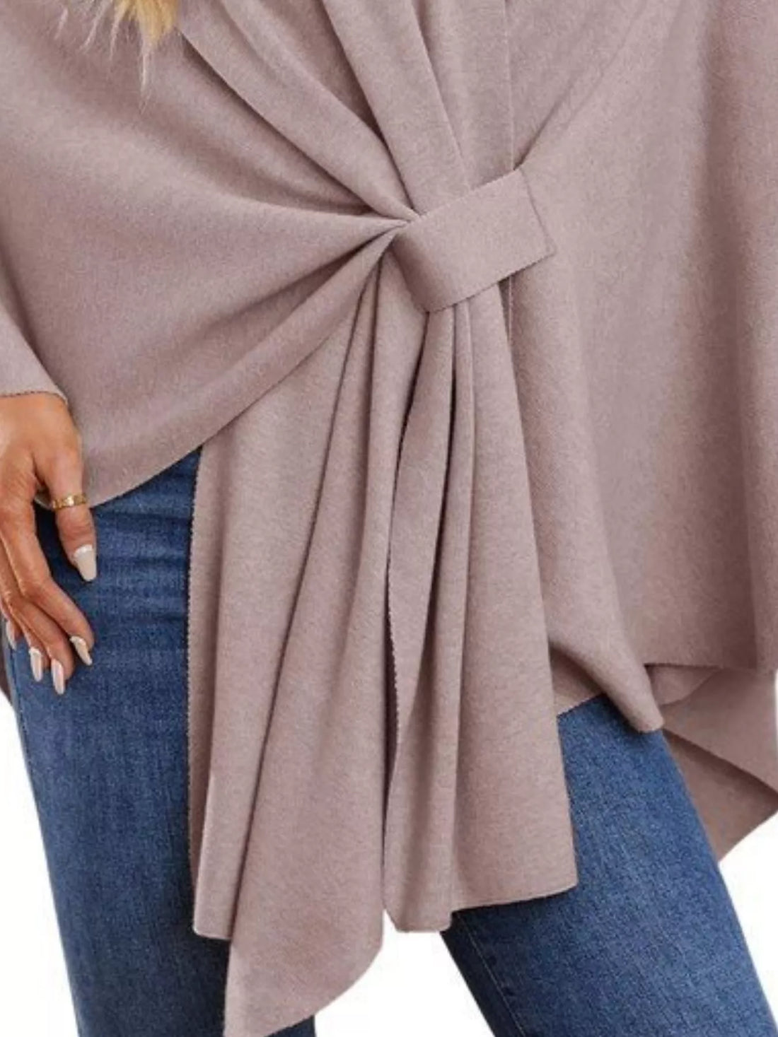 Women’s shawl cape detail: front tie knot with pleated drape over denim