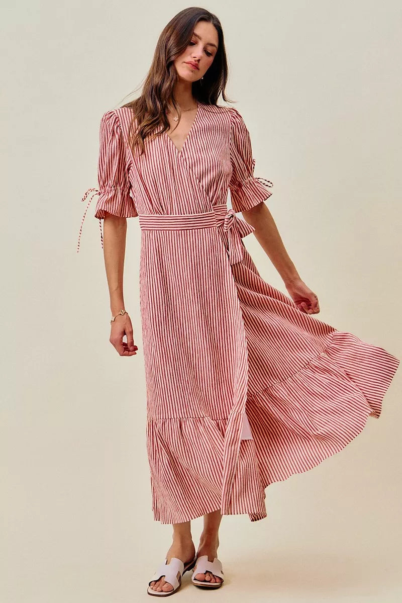 Red striped wrap midi dress with short puff sleeves and flowing tiered skirt