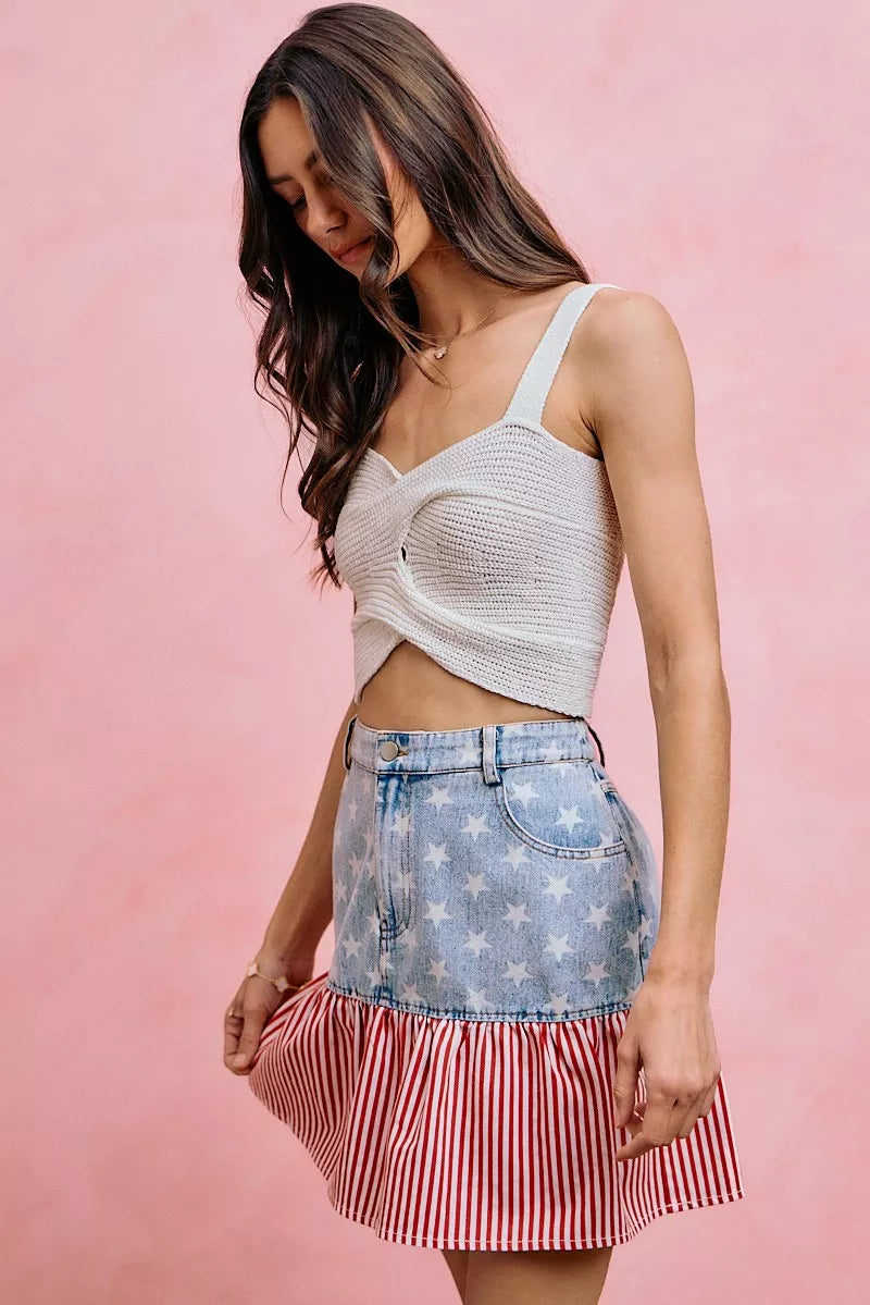 Fit-and-flare denim mini skirt, front view, blue stars and red-white striped ruffle