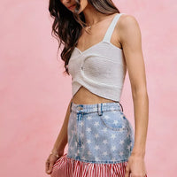 Fit-and-flare denim mini skirt, front view, blue stars and red-white striped ruffle