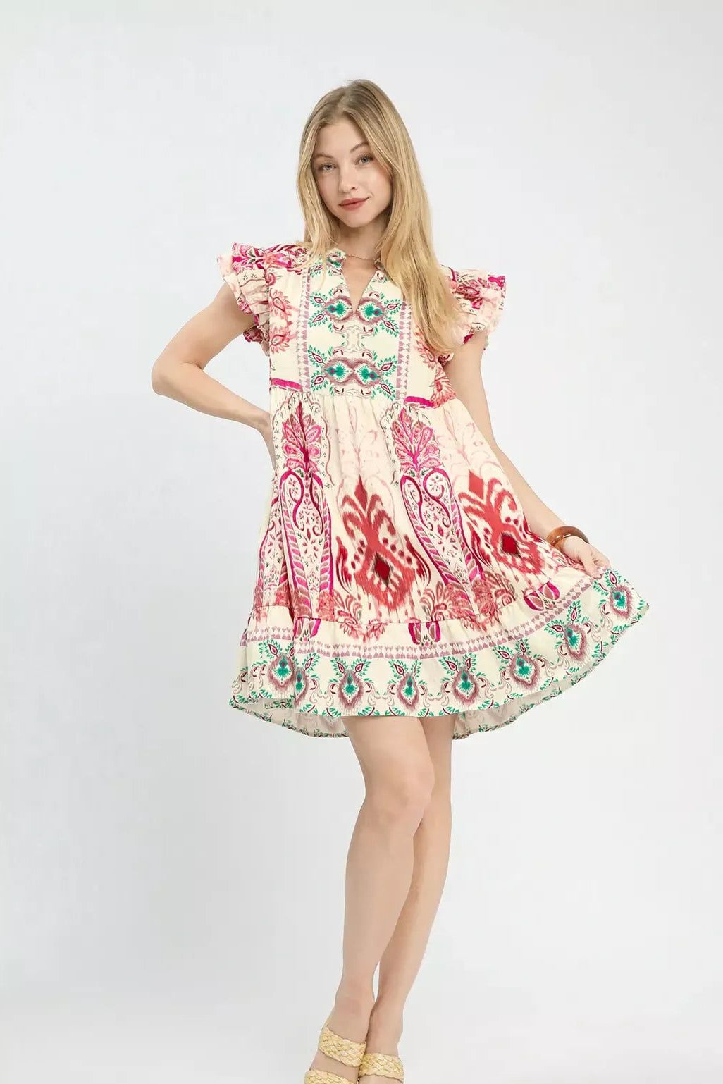 Boho print ruffle sleeve dress, full view, pink and red paisley with teal patterned hem