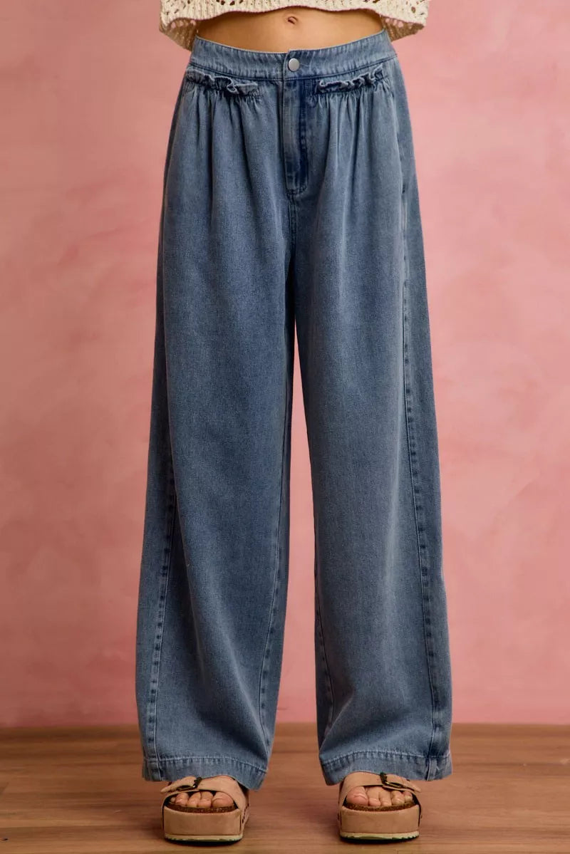 Denim wide-leg jeans with ruffled elastic waistband, button front, and patch pockets