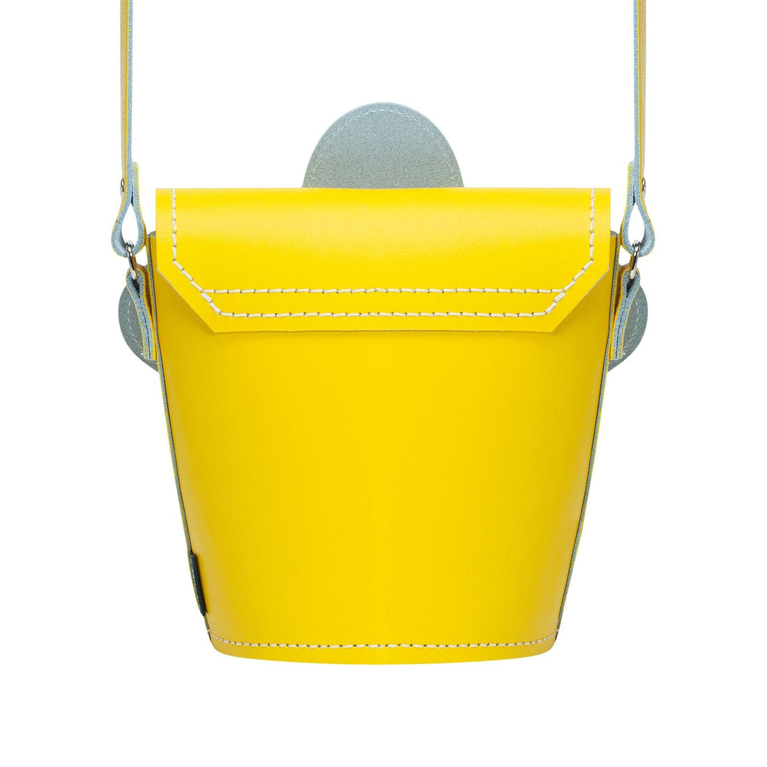 Pastel yellow leather barrel bag with top handle and stitched bucket shape