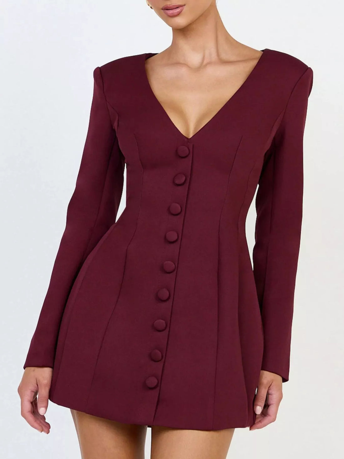 Wine red blazer dress with deep V-neck and long sleeves, vertical button closure